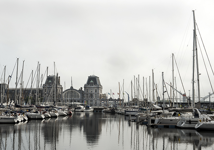 The city of Ostend with the train station and the port
