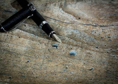 De pen van de statushouder